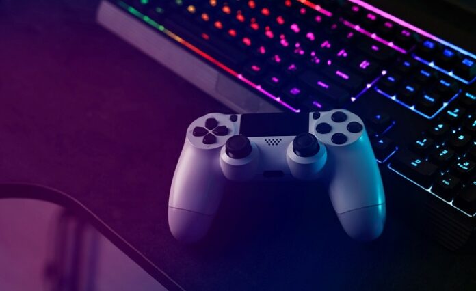 Playing,Video,Games.,Computer,Keyboard,With,Rgb,Lighting,And,Wireless
